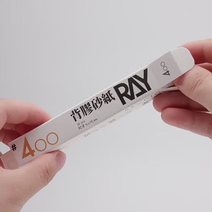 Pre-cut adhesive-backed sandpaper strips